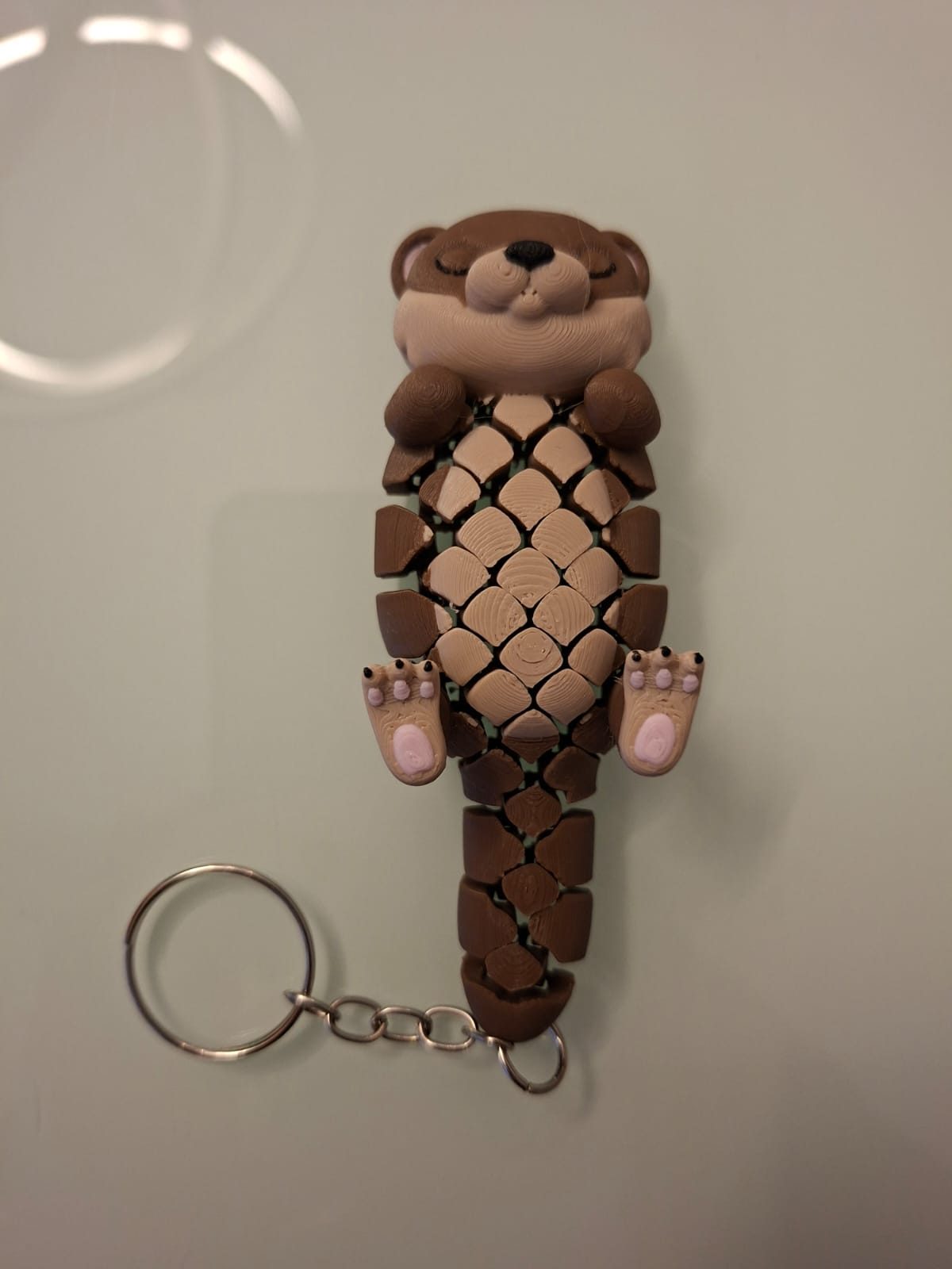 Chaveiro Sensorial Lontra 3D Articulada – 10 cm